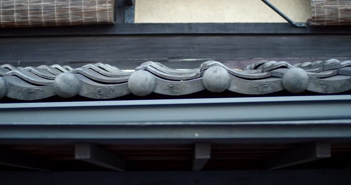 Beautiful old town traditional Japanese rooftop palets early in the morning in Kyoto, Japan soft lighting