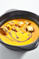 Pumpkin soup with croutons and strachatella