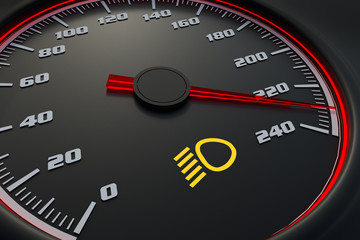 Low beam light on car dashboard