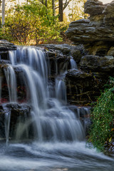Obraz premium Cascading water in a Chinese botanical garden