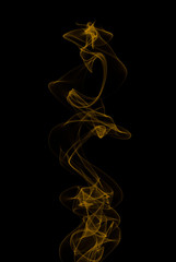 Abstract yellow cigar smoke on black background