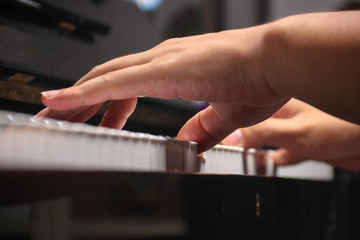 The boys are practicing piano in order to prepare to live music.