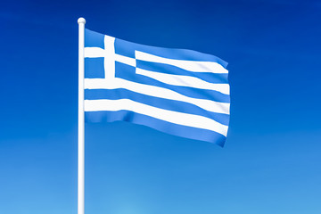 Waving flag of Greece on the blue sky background