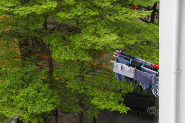 Drying clothes on the tallest building old-fashioned.