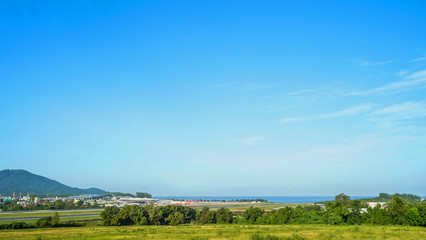 Obraz premium Bright sky background near the sea next to Phuket International Airport, Phuket Thailand.