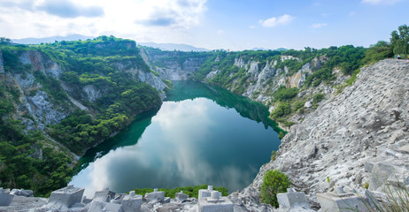 Deserted grand canyon A beautiful mine with a blue water reservoir 001