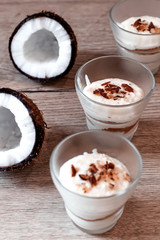 Coconut tender dessert in cafe. Dessert in glass for Valentine's day.