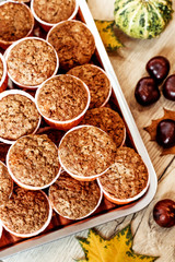 Pumpkin and carrot cupcakes. Healthy autumn pastries. Cafe concept, menu.