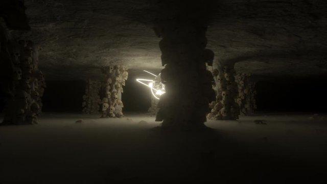 Horrific halloween dark cave vj loop with pillar filled with skull, skulls on foggy floor and animated skull master in center with glowing light. Energic camera move.