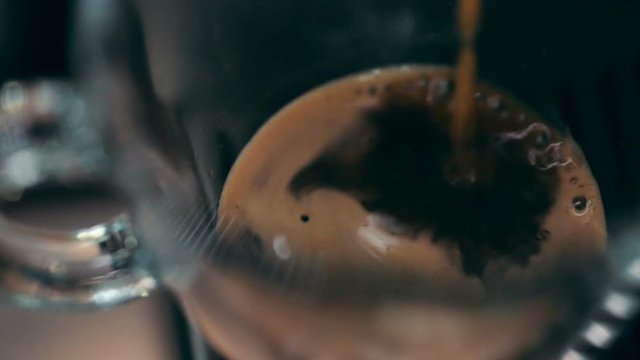 Preparation of natural delicious coffee in the automatic coffee machine.  Good morning.