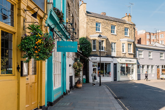 Picturesque street with small business and stores at Notting Hill in London, UK