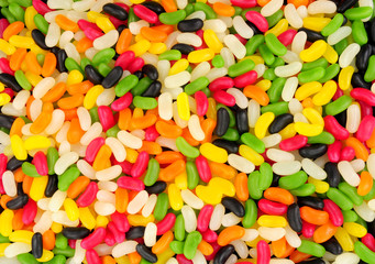 Colourful jelly bean shaped candy sweet background