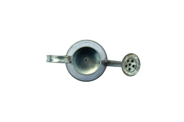 decorative candlestick, aluminum small toy metal watering can isolated on white