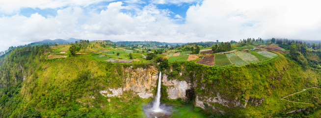 Aerial view Sipiso-piso waterfall in Sumatra, travel destination in Berastagi and Lake Toba, Indonesia.