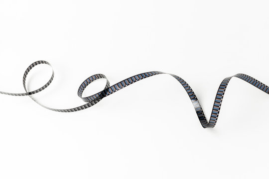 Curled Filmstrip Isolated On White Background