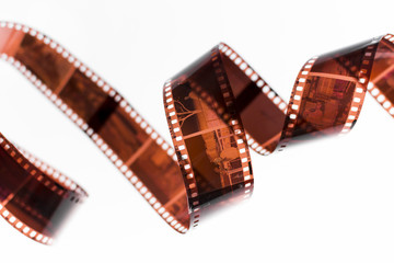 Fototapeta na wymiar Swirl negatives film isolated on white backdrop