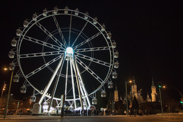 night ferris wheel illuminated with lights