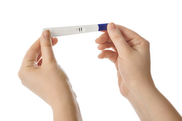 Woman hands with pregnancy test