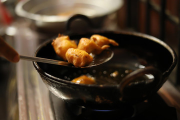 Woman In Kitchen Preparing Snack at kitchen