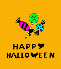 colored lollipops on an orange background, happy Halloween