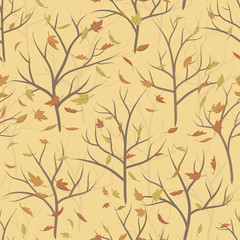 Seamless pattern of autumn tree branches and falling leaves