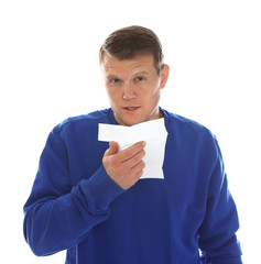 Man suffering from cold on white background