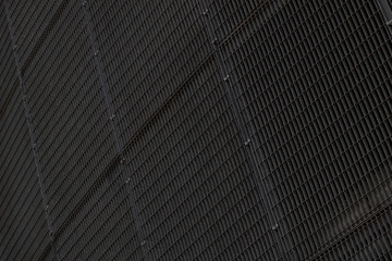 Close-up of black metal mesh - ventilation grill - inside building