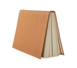 Open hardcover old book on white background