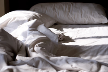 Bed sheets are matted in the morning. Wake up time.