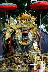 Wooden carved statue of Barong in hindu temple in Bali-Indonesia	
