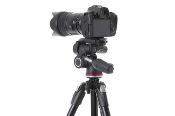 Backside view of modern multifunctional black camera isolated