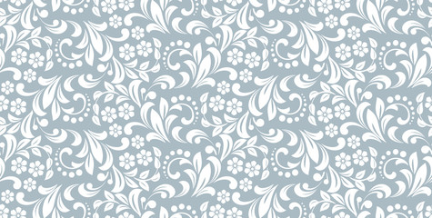 Flower pattern. Seamless white and blue ornament. Graphic vector background. Ornament for fabric, wallpaper, packaging
