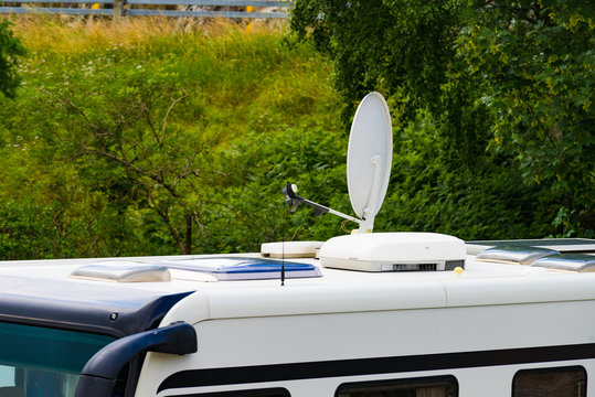 Satellite dish on roof of camper van