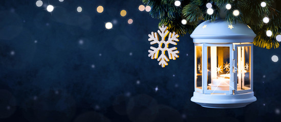 Christmas Lantern On Snow With Pine Branch