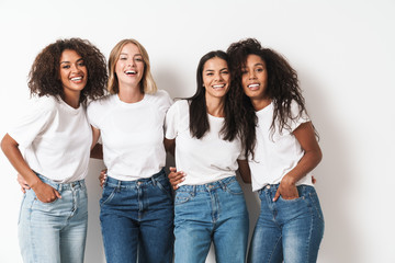 Optimistic cheery young women multiracial friends