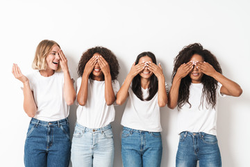 Optimistic cheery young women multiracial friends