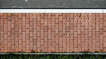 Modern pavement tile top view texture background.