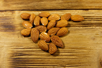 Almonds on a rustic wooden table
