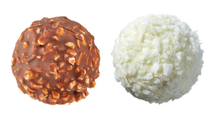 Beautiful pair of white and dark chocolate ball shaped candies with filling, nuts and coconut shavings isolated on white background. Full sharpness across the entire field of the frame.