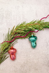Vintage Christmas tree toys. New Year holiday concept. Evergreen pine branch