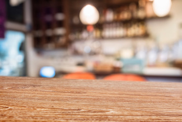 Naklejka na ściany i meble Table top Wooden counter Bar cafe blur background