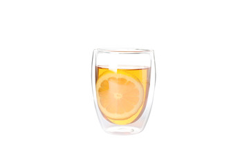 Glass with lemon slice and tea isolated on white background