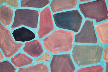 The surface of the wall is painted with paint in the form of a mosaic of colorful irregular...
