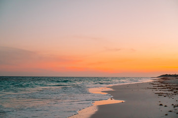 Obraz premium Amazing beautiful sunset on an exotic caribbean beach