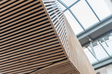 Obraz premium Wooden architecture bridge in modern building