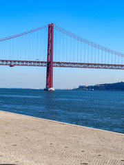 25th April Bridge in Lisbon, Portugal. Famous landmark on river Tagus.