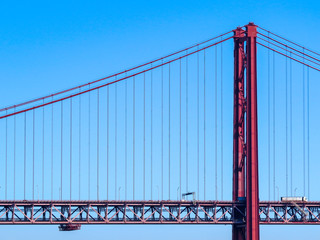 25th April Bridge in Lisbon, Portugal. Famous landmark on river Tagus.