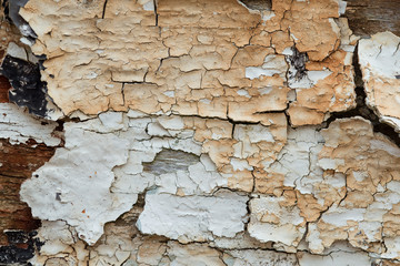 de la peinture écaillée sur du bois