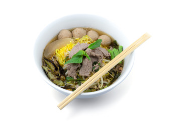 Bowl of noodles with meatballs and boiled beef isolated on white background with clipping path