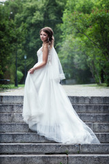 Fototapeta na wymiar portrait of a young bride in a white dress